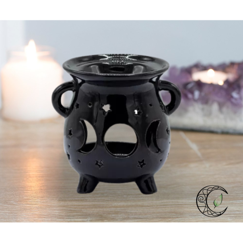 Brûleur à huile chaudron noir en céramique avec découpes triple lune et étoiles